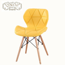 Venta al por mayor de lujo barato muebles Alibaba estilo escandinavo nórdico amarillo silla de comedor de cuero PU con patas de haya de madera